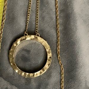 Gold tone double strand necklace. Reversible pendent